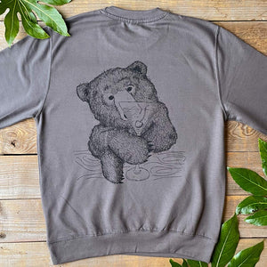 dark grey sweater with bear and cocktail